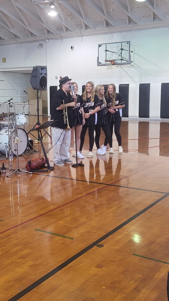 Softball girls getting ready to dance